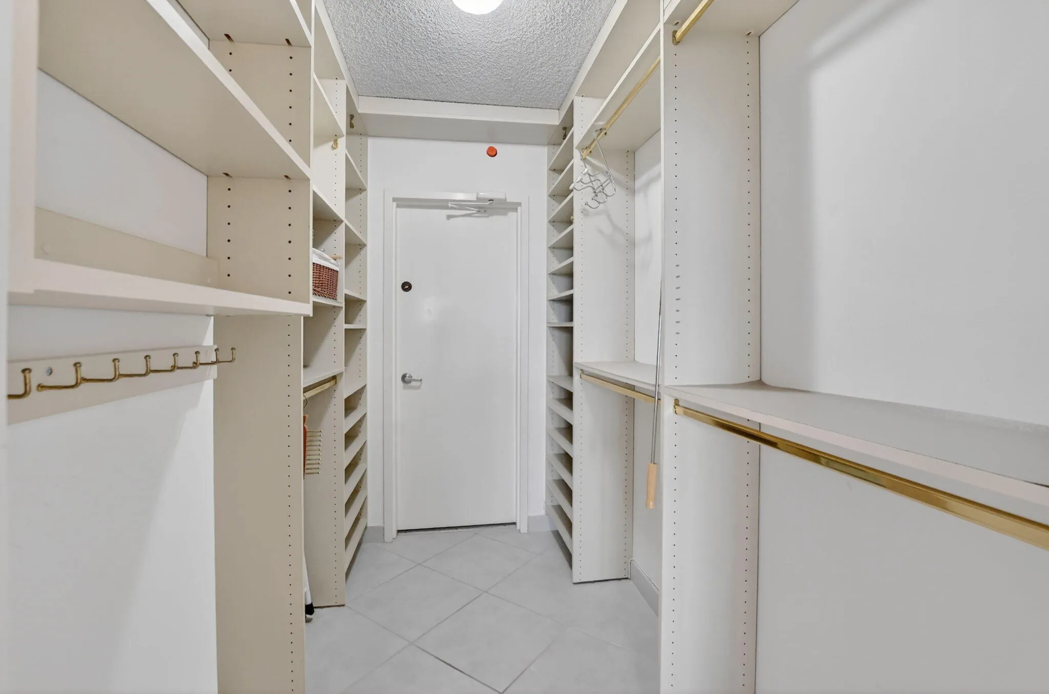 PRIMARY BEDROOM WALK-IN CLOSET