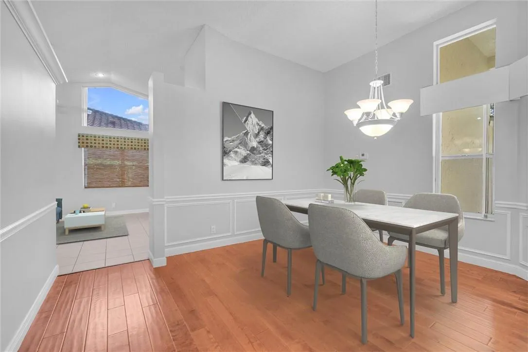 This portion of the covered patio with ceiling fan is accessed directly from formal living areas.