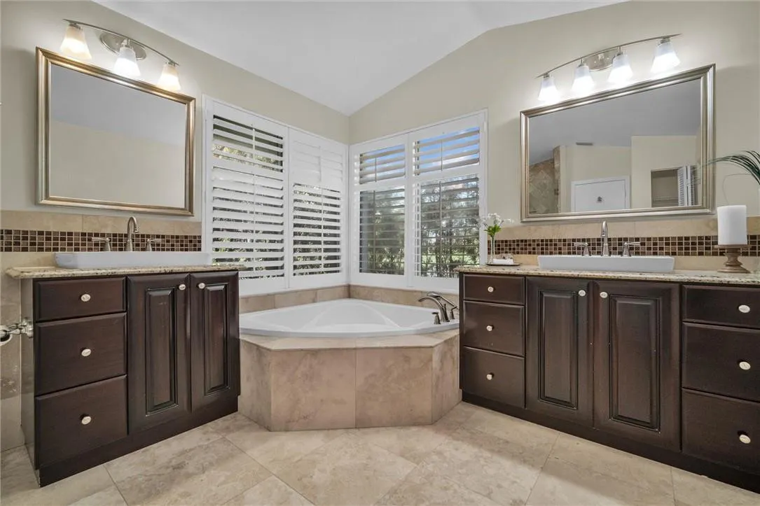 Remodeled master bathroom w/cabana door to the pool.
