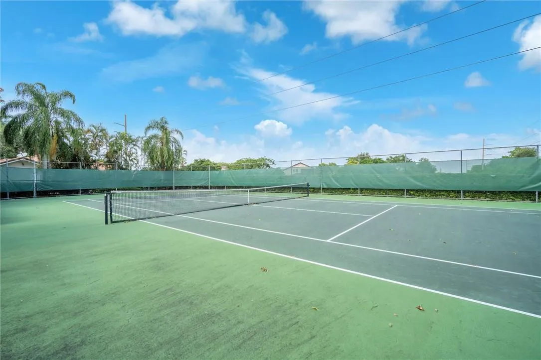 Sunset Springs is one of the very few communities in all Weston that has a tennis court for its residents! The score is love!
