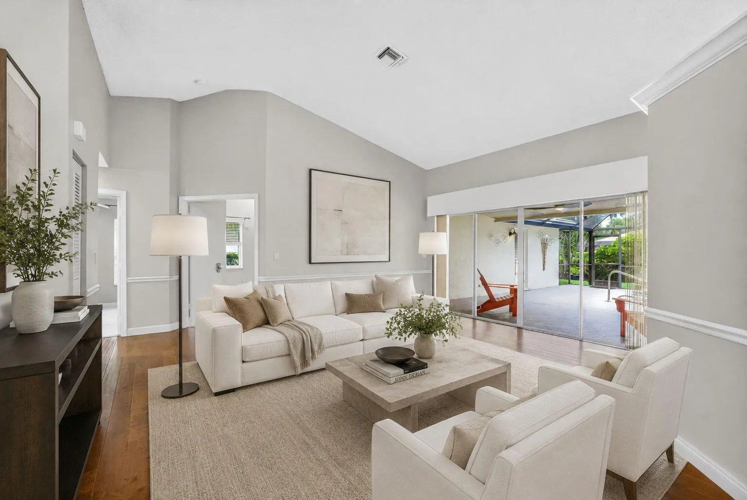 Virtually staged formal living room.