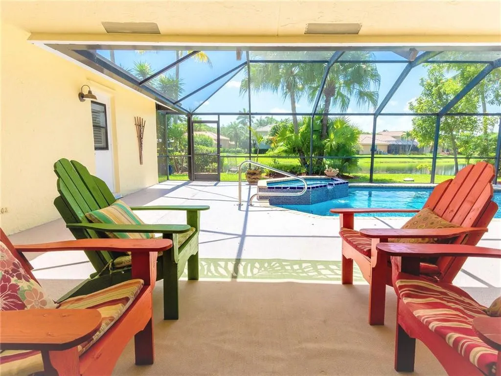 Step from living room onto this marvelous covered patio with relaxing chairs to enjoy the views!