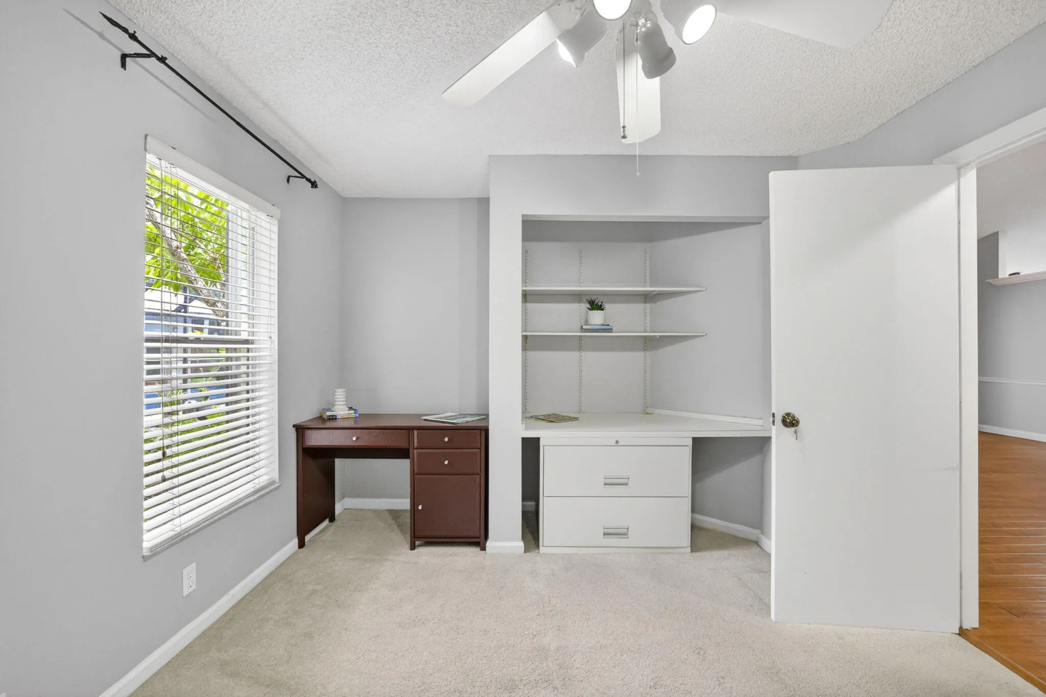 4th Bedroom has built-in desk with shelving, used as den but room for a closet too.