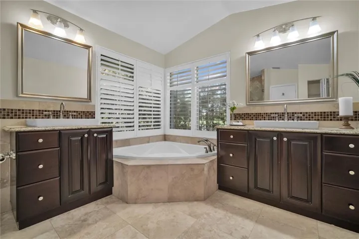 Remodeled master bathroom w/cabana door to the pool.