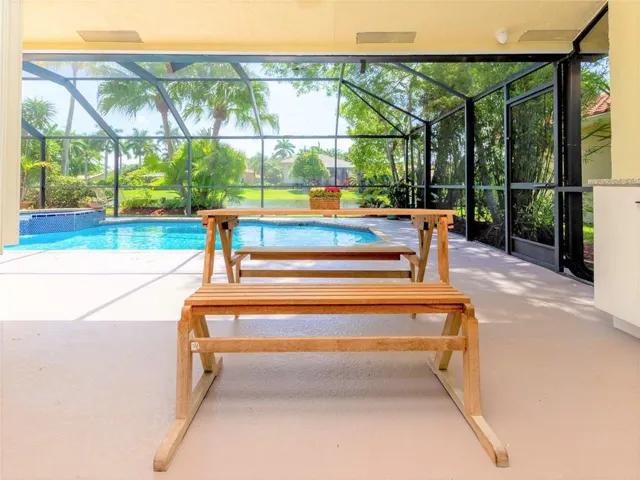 Double covered patio areas with built-in granite serving station.