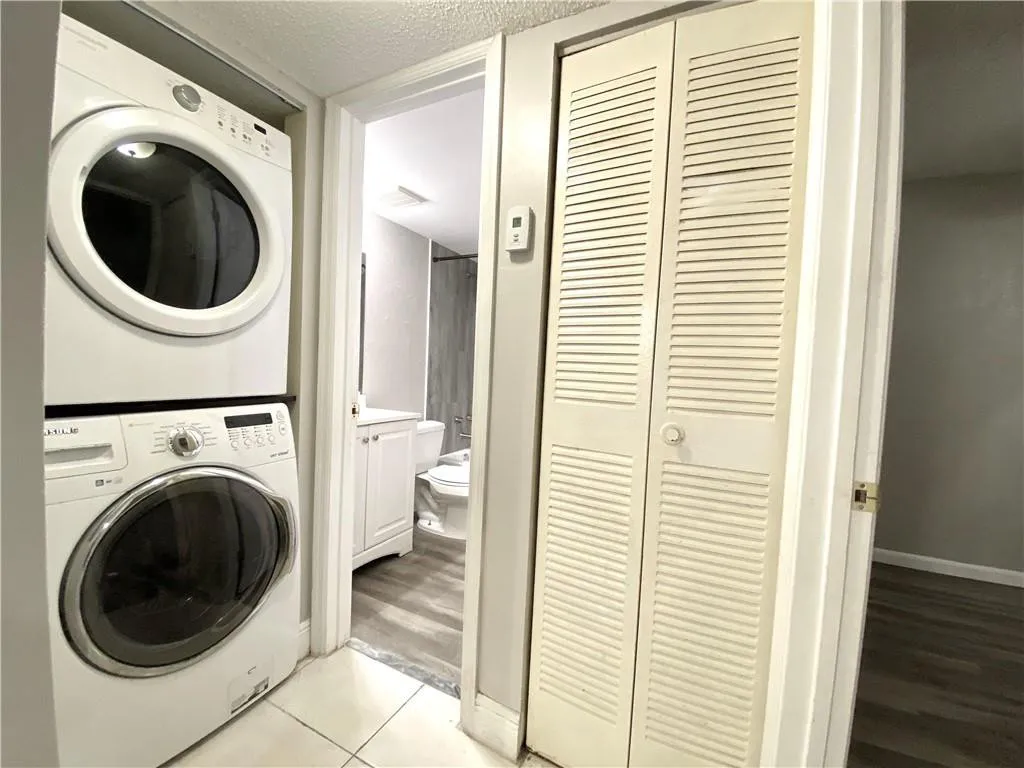 guest bathroom washer/dryer AC closet