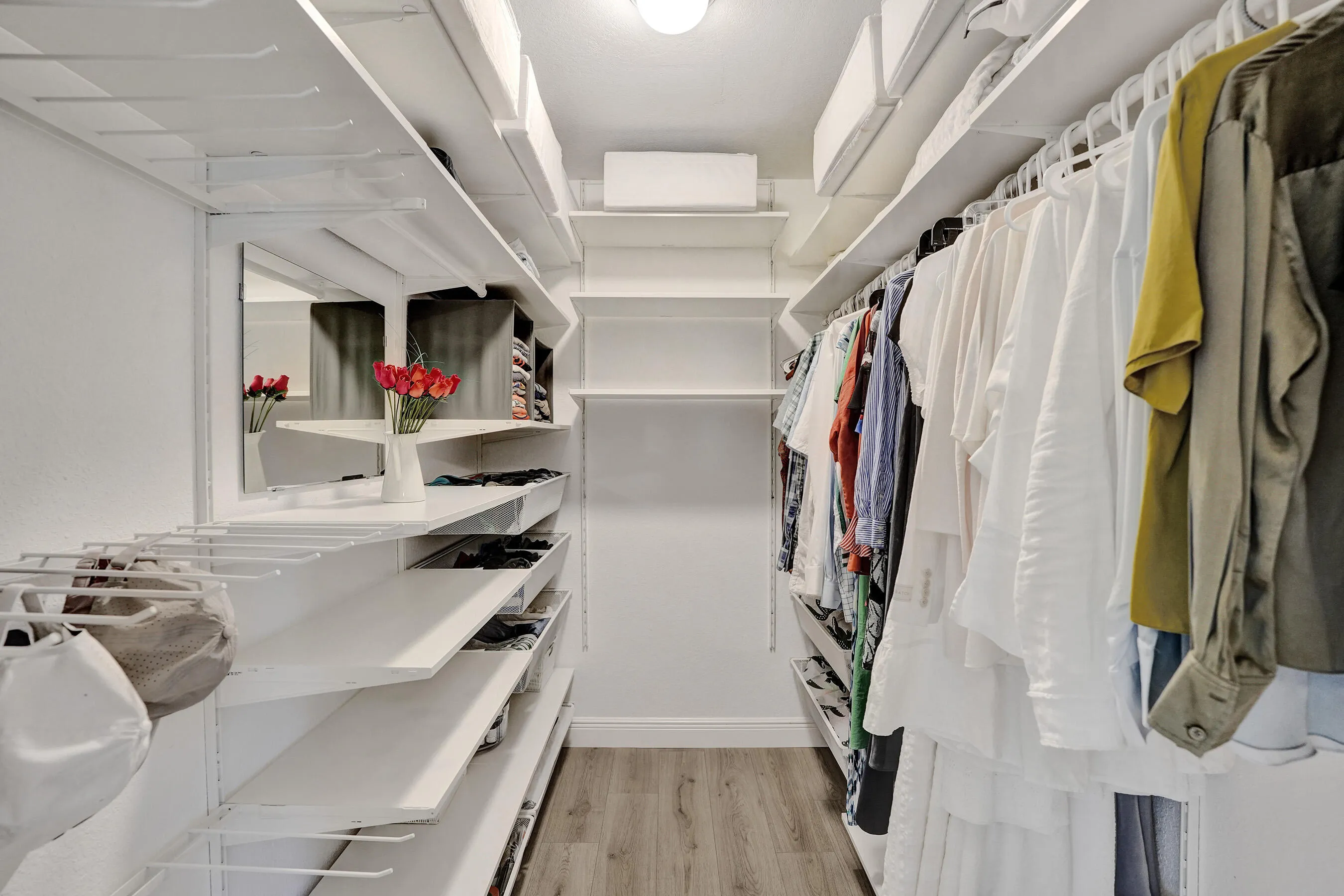 Primary customized walk-in closet