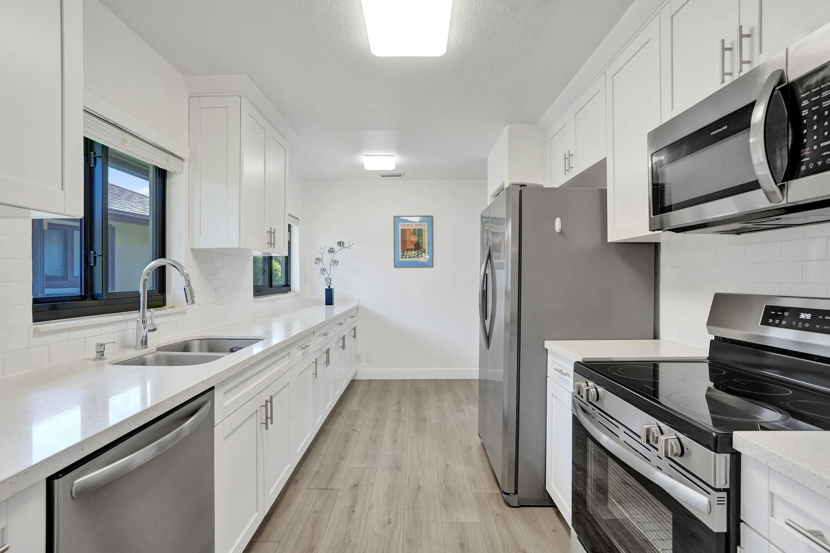 Long Galley kitchen completely updated