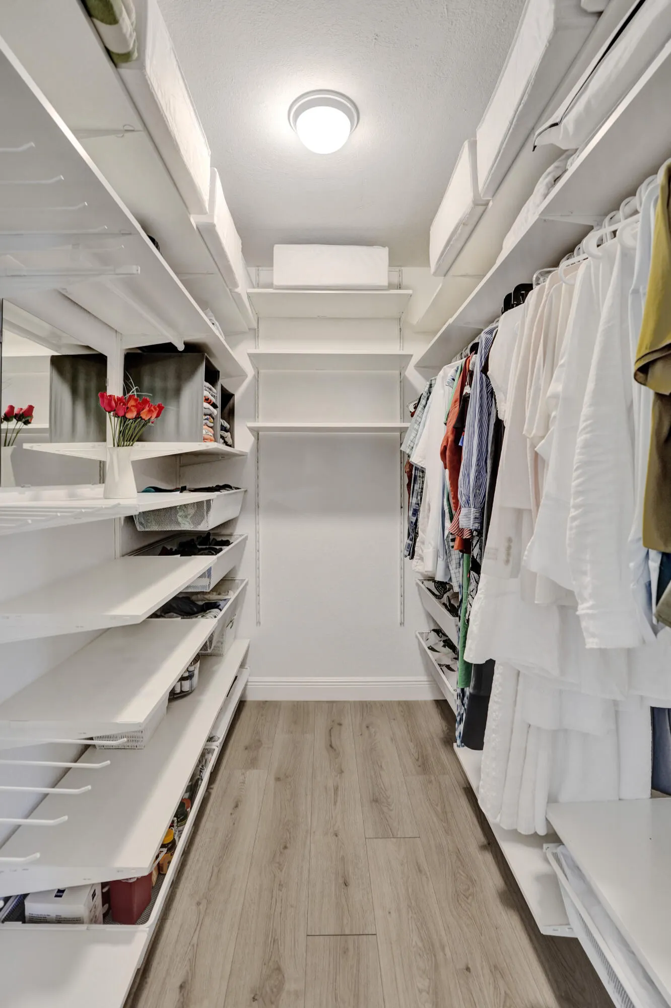 Primary customized walk-in closet