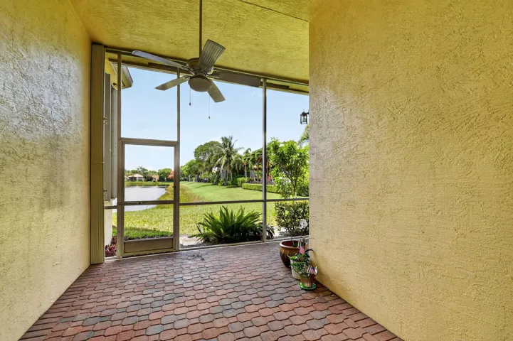 Enjoy the water view from your covered and screened patio