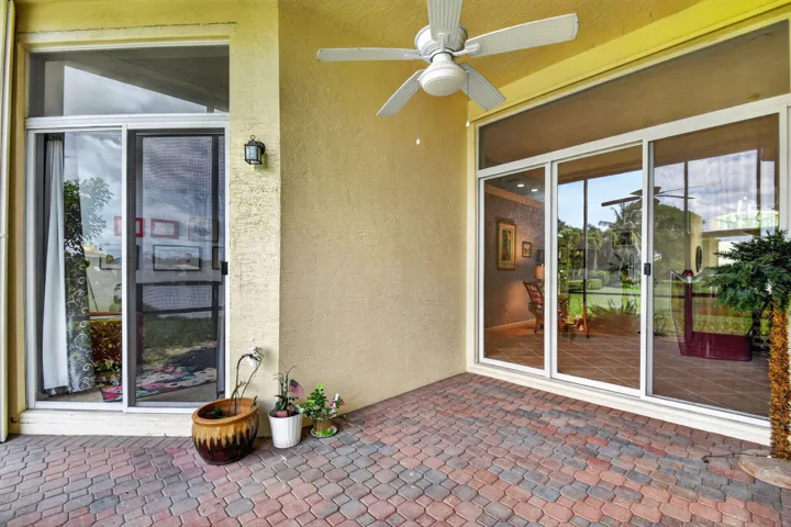 Enjoy the water view from your covered and screened patio