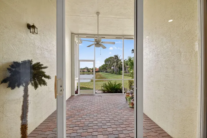 Enjoy the water view from your covered and screened patio