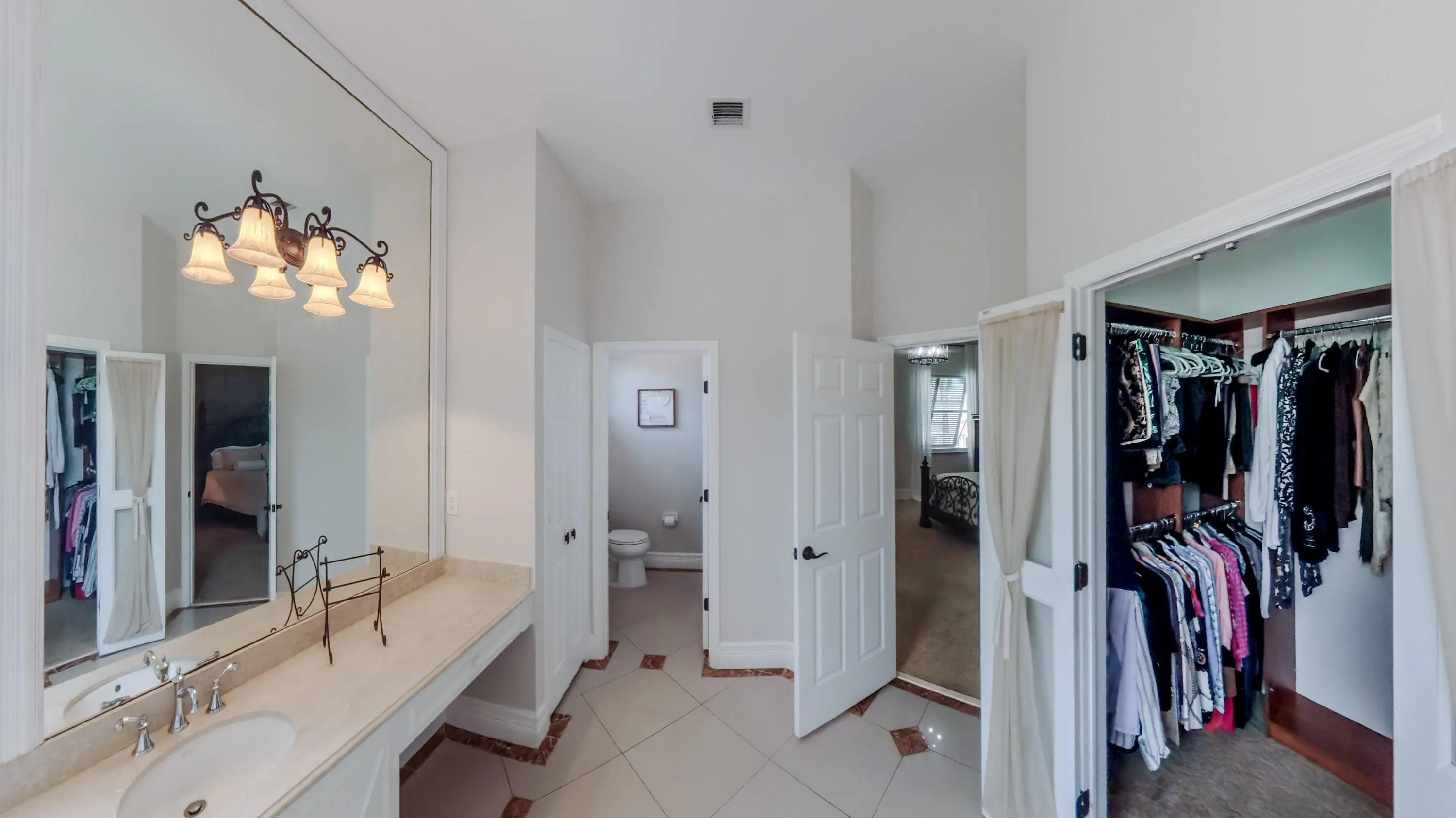 Primary bath and walk-in closet.