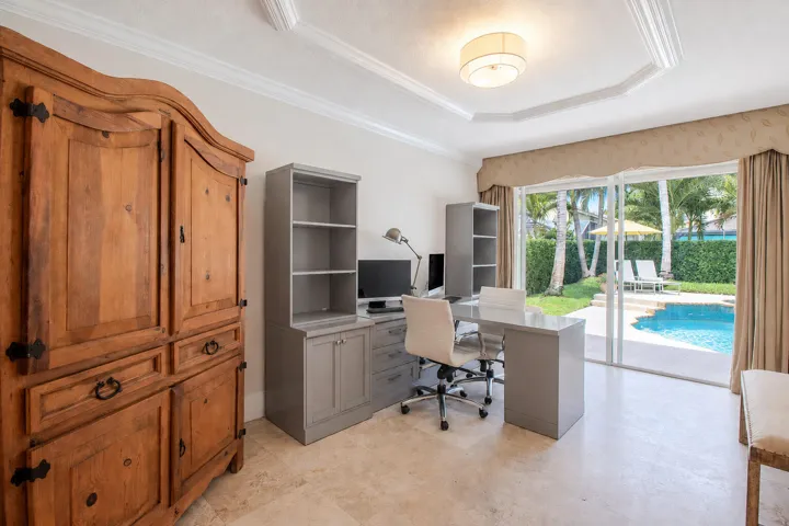 4th bedroom or den with sliders to pool