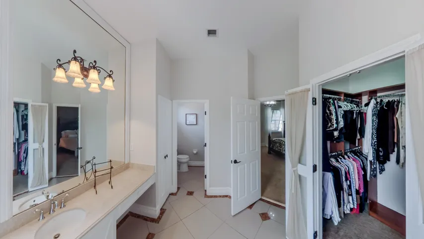 Primary bath and walk-in closet.