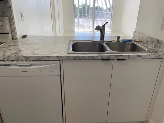 Kitchen - Dishwasher and Sink.