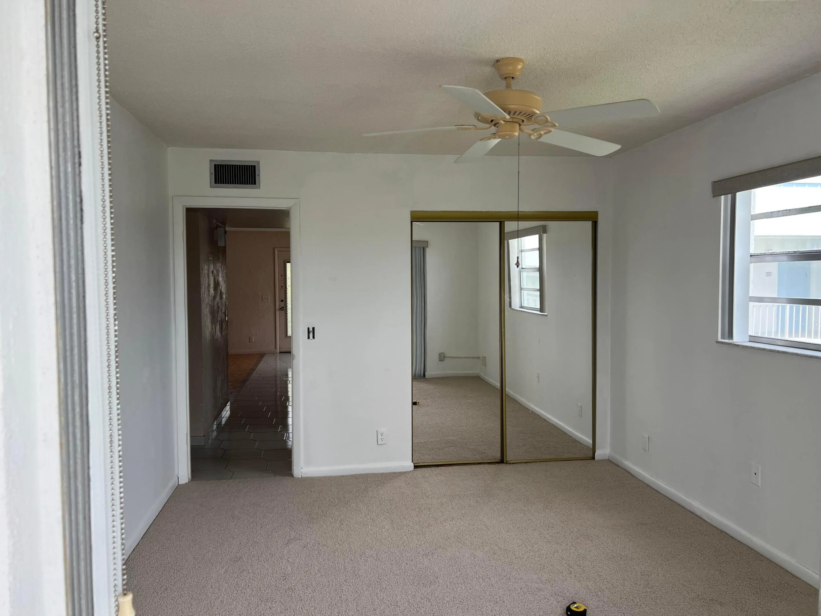 Spacious second bedroom or den with new carpeting
