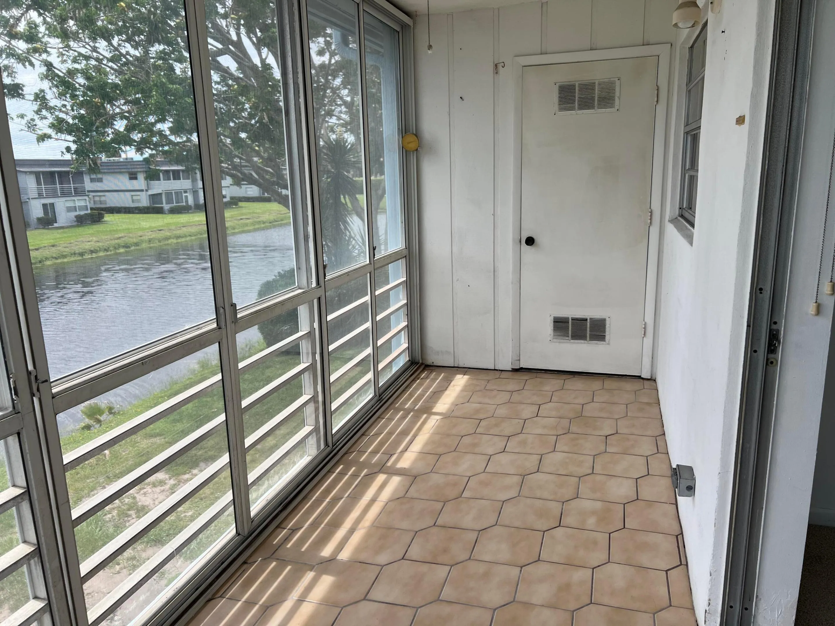 Washer and dryer in storage room on patio