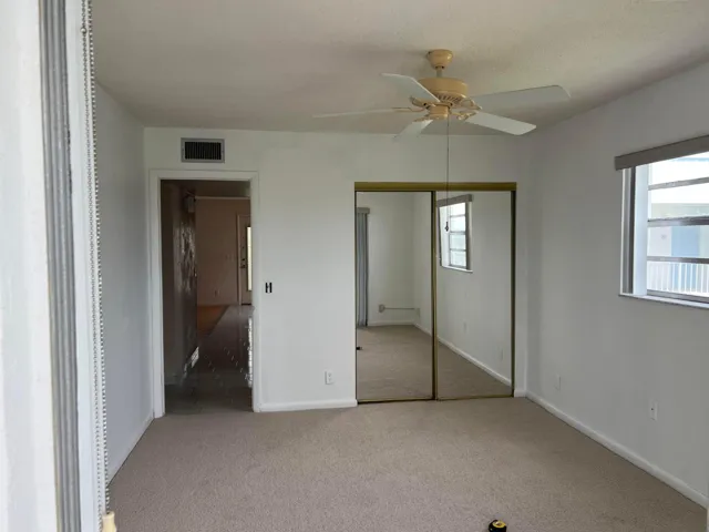 Spacious second bedroom or den with new carpeting