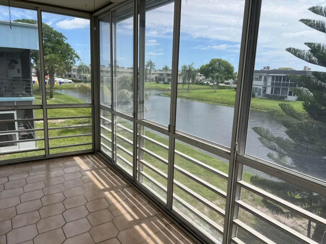 Screened and plexi-glass enclosed patio