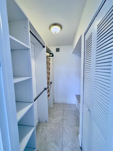 Bedroom one with walk-in closet
