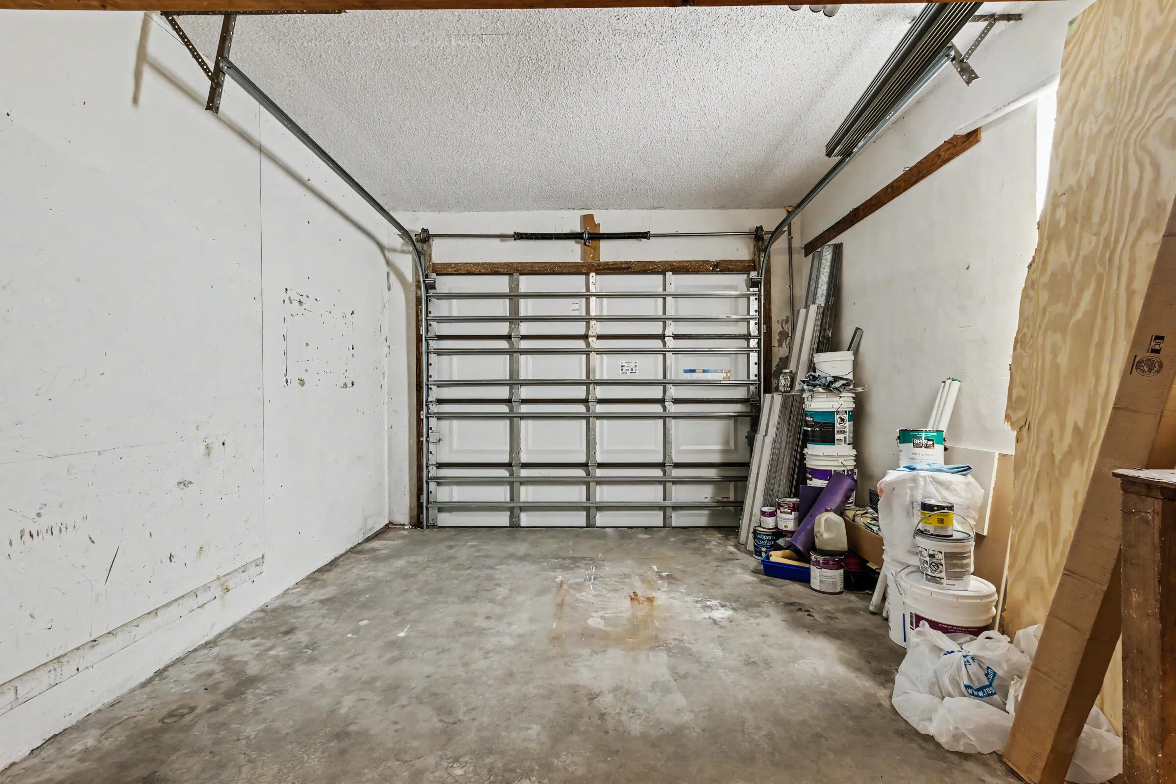 One car garage with laundry and built in storage