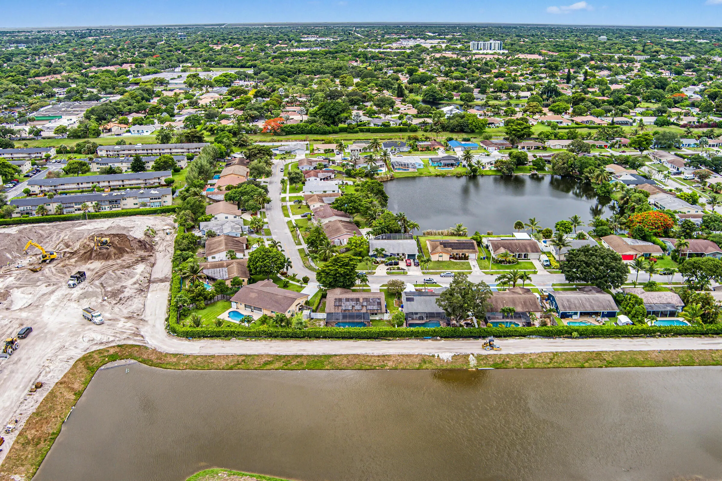 Property backs up to a service road and lake so no direct rear neighbors