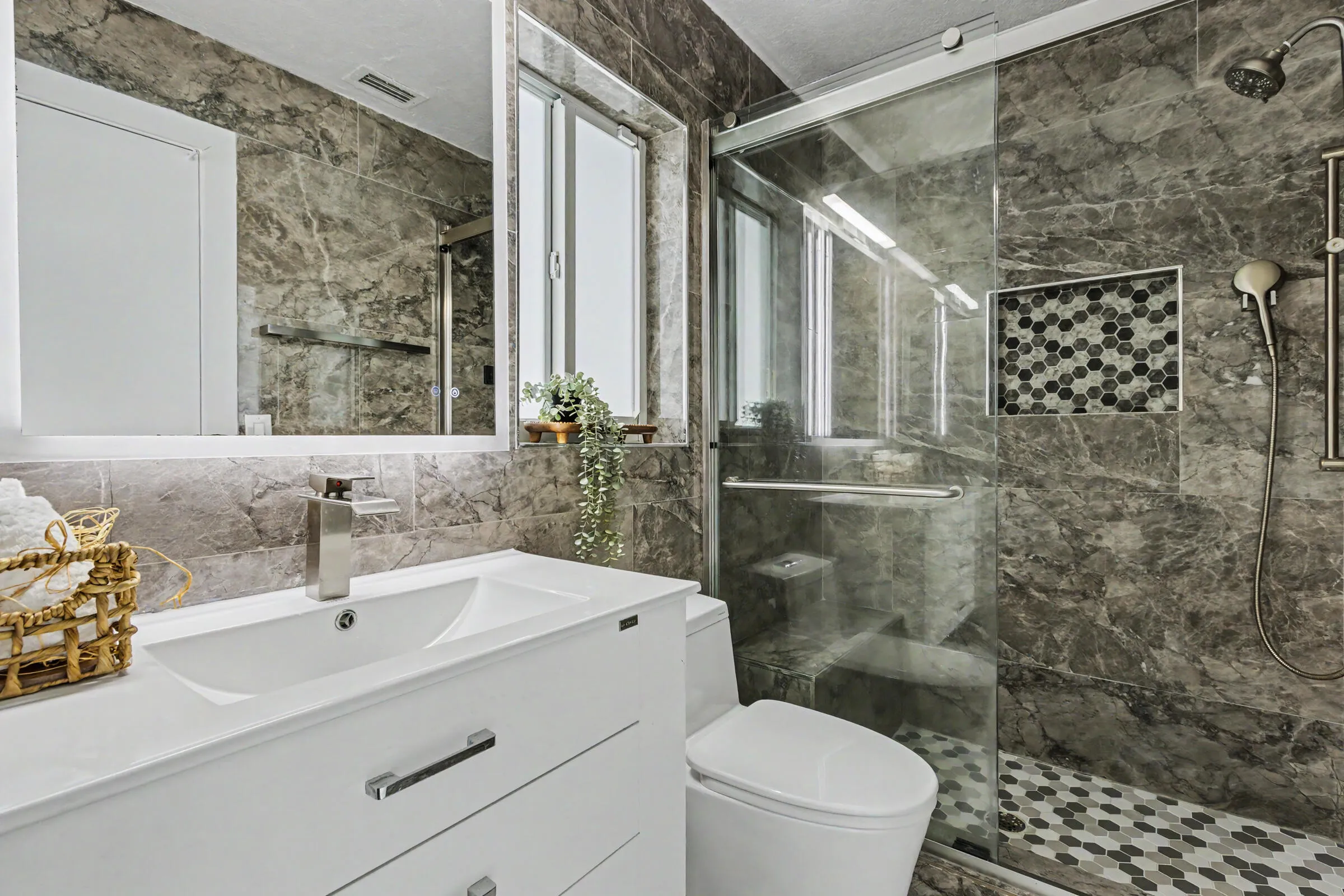 Primary bath with modern features and heated/lighted mirror