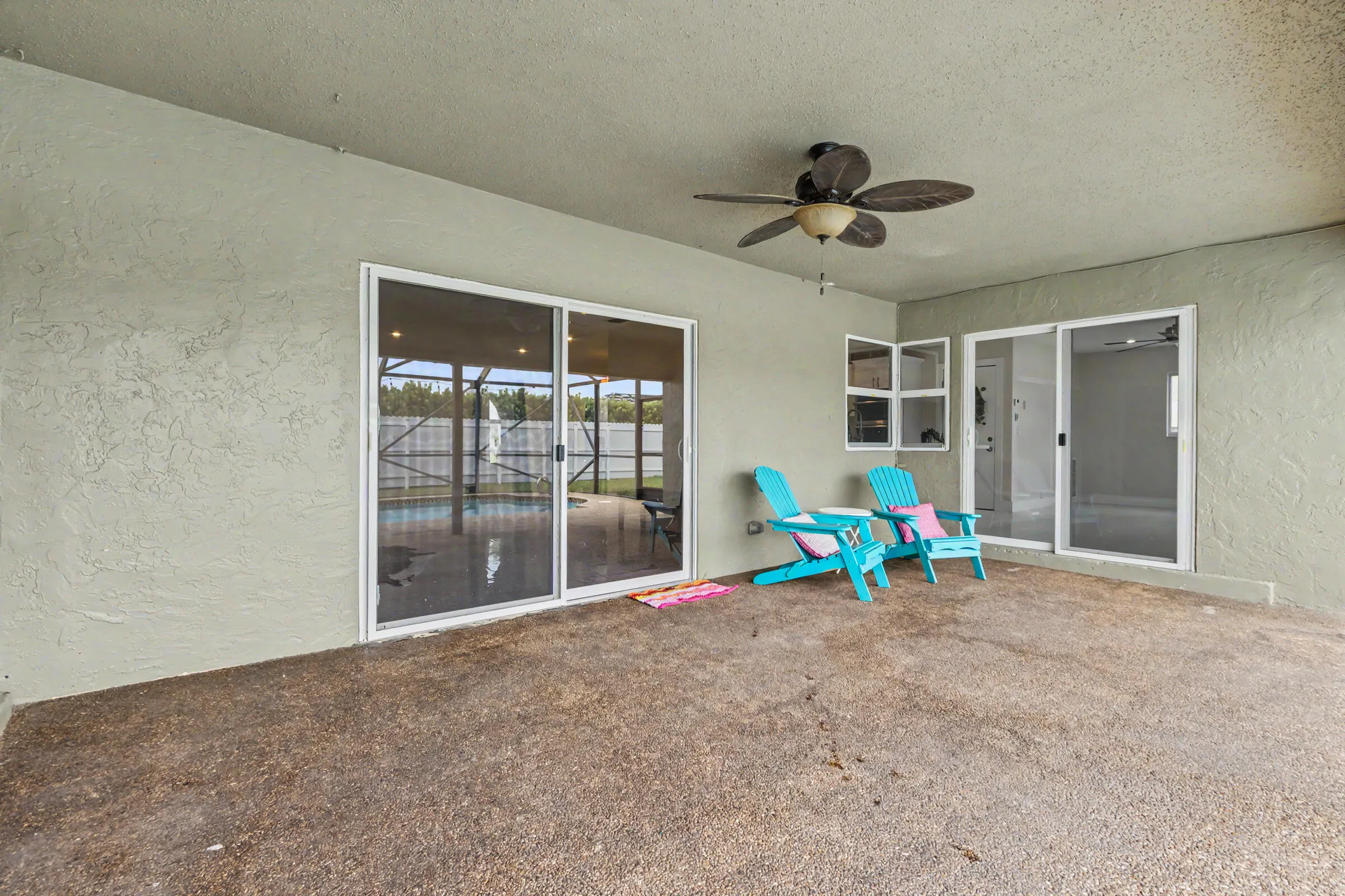 Spacious covered patio inside the screened enclosure