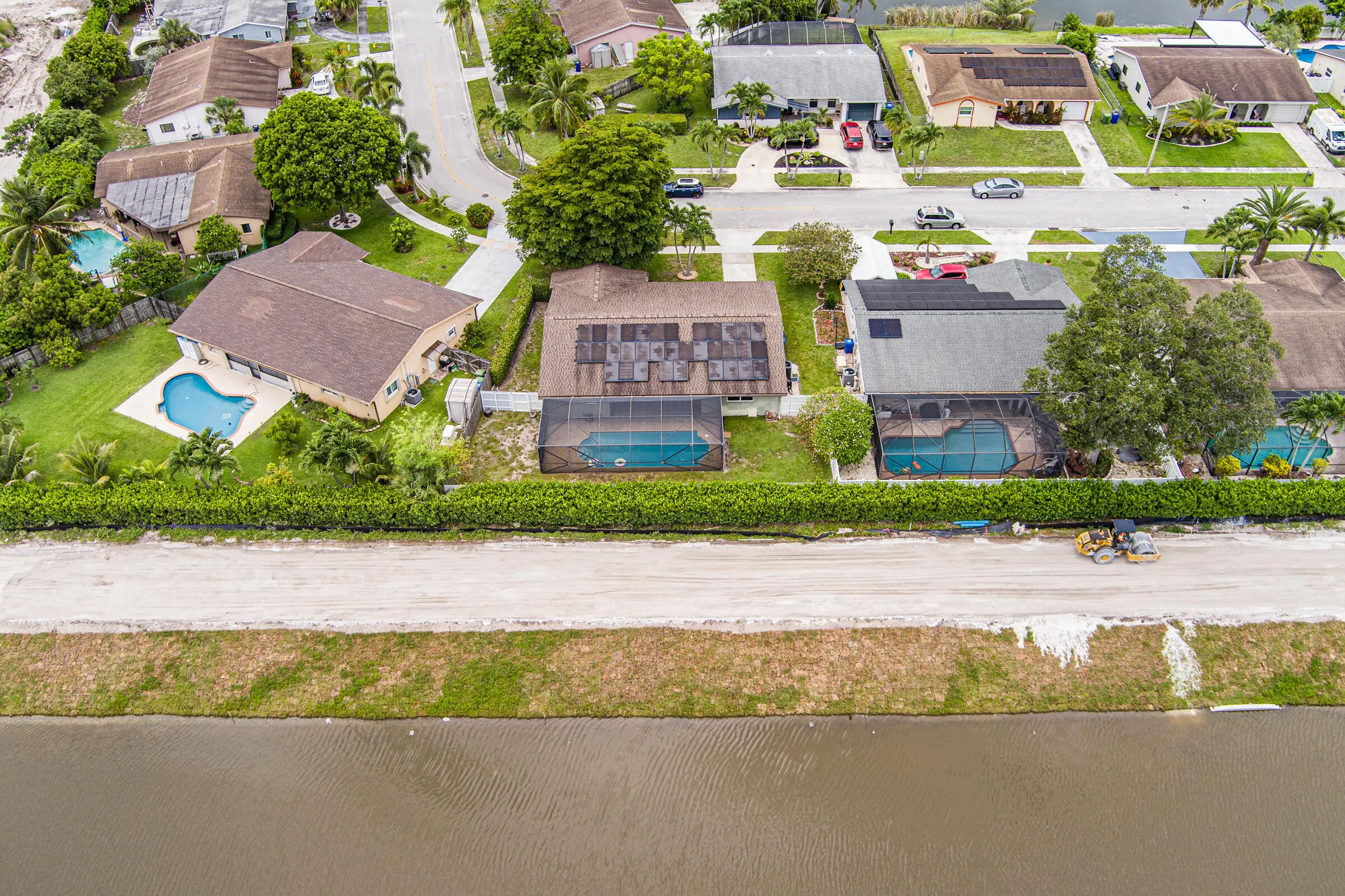 Property backs up to a service road and lake so no direct rear neighbors