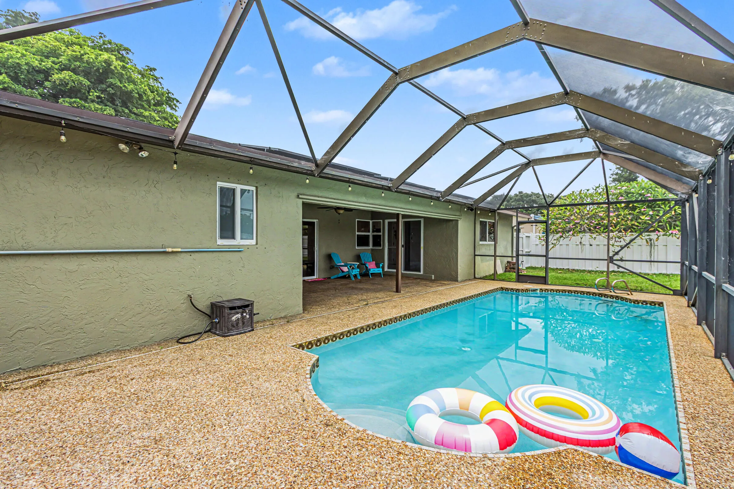 Large covered patio inside the screen enclosure