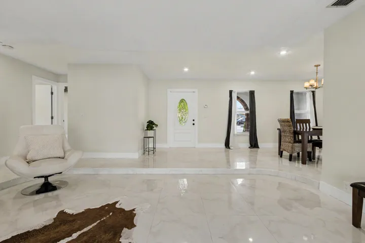 Entry into open living and dining space