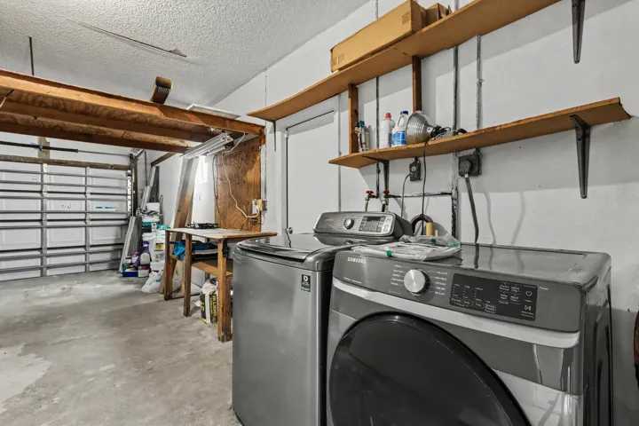 One car garage with laundry and built in storage