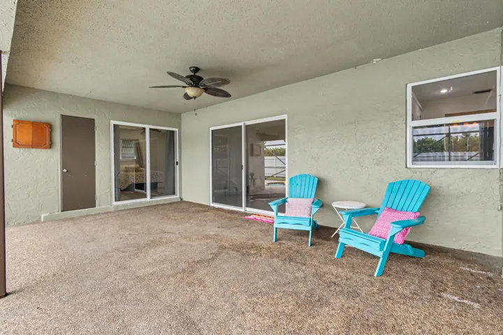 Spacious covered patio inside the screened enclosure