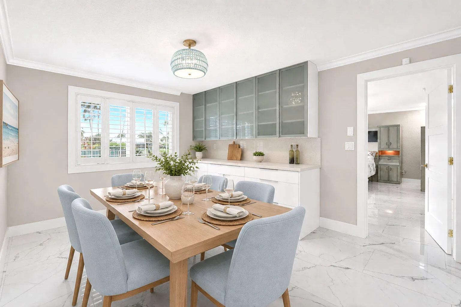 Big dining area with extra buffet and cabinets is perfect for family meals and gatherings.