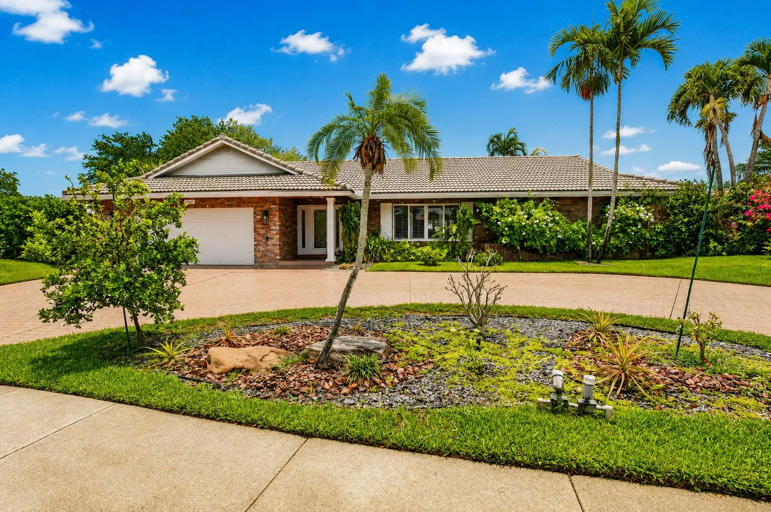 This beautifully UPDATED 3/2.5 residence offers 2,400SF of thoughtfully designed living space on a private LAKEFRONT, HUGE lot!