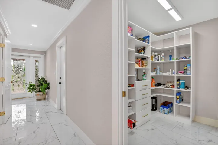 Walk-in pantry with tons of storage.