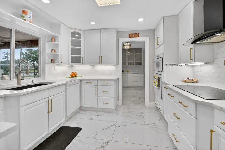 42" hand crafted custom Shaker cabinets with under cabinet lighting.