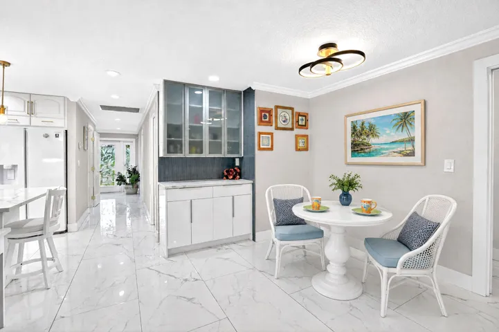 Savor morning coffee at the breakfast nook with extra coffee bar.