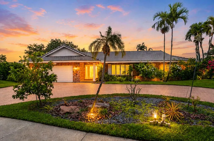 This beautifully UPDATED 3/2.5 residence offers 2,400SF of thoughtfully designed living space on a private LAKEFRONT lot.