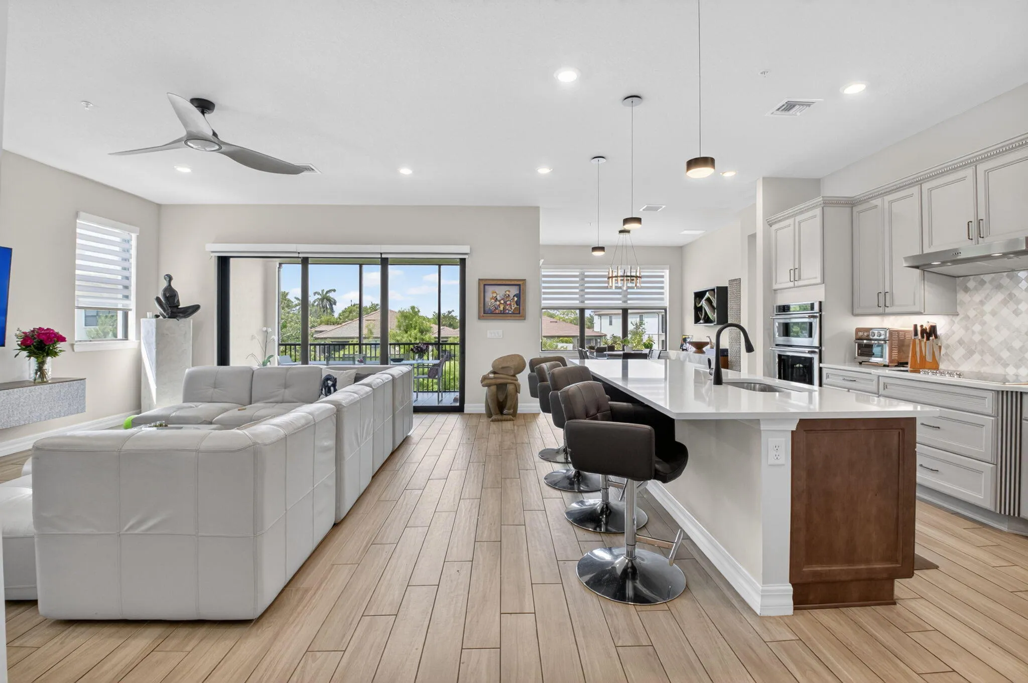 Great Room with volume ceilings and lake views