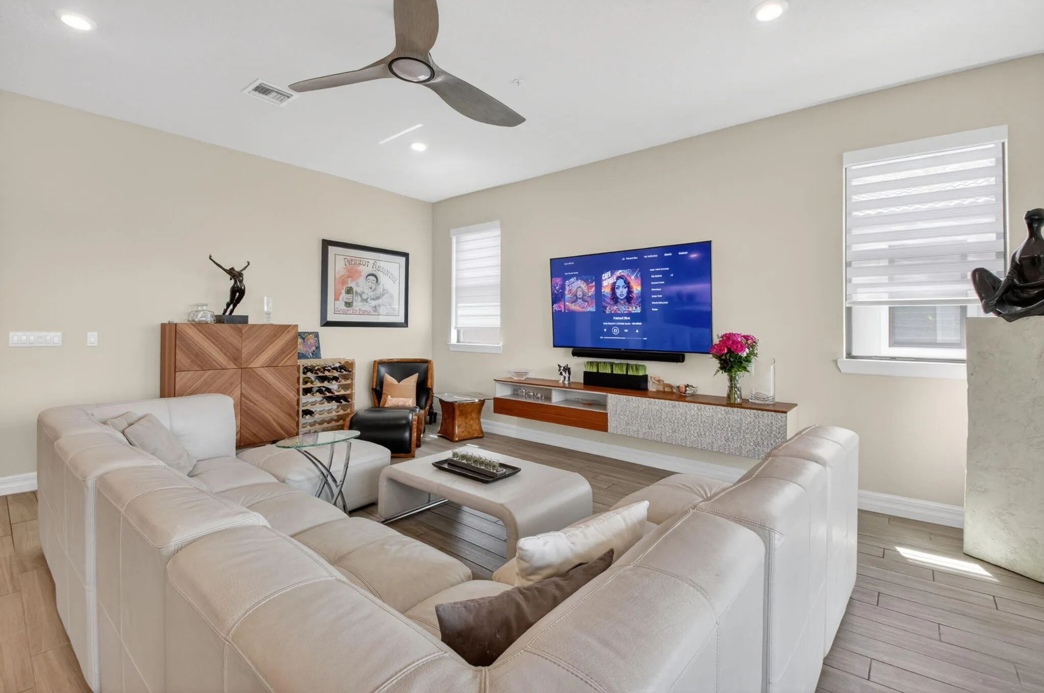 Great Room with volume ceilings and lake views