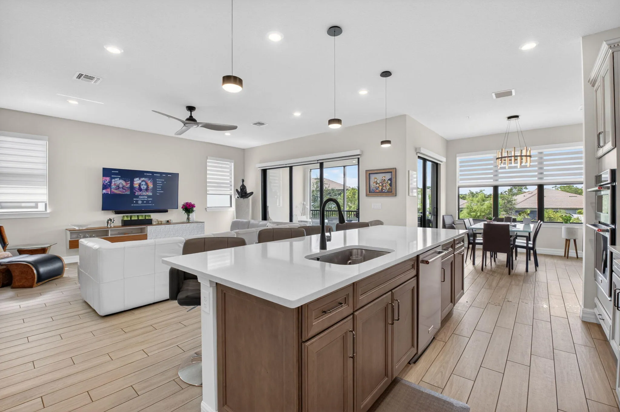 Oversized kitchen with walk-in pantry, 42" cabinets, KitchenAid appliances, quartz countertops, and much more!