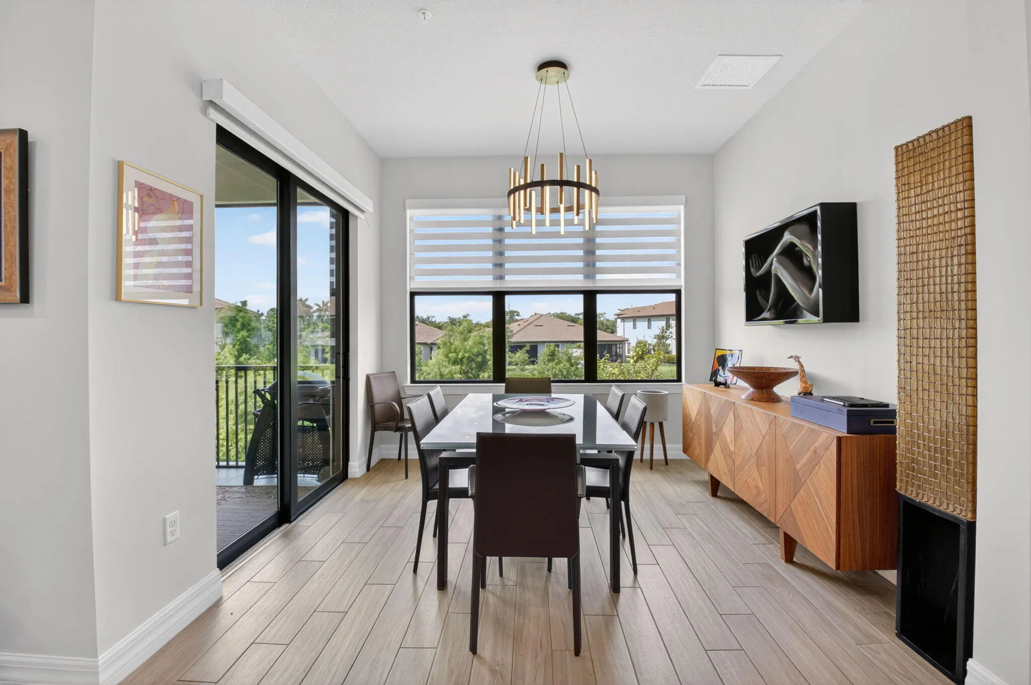 Dining Room with volume ceilings and lake views
