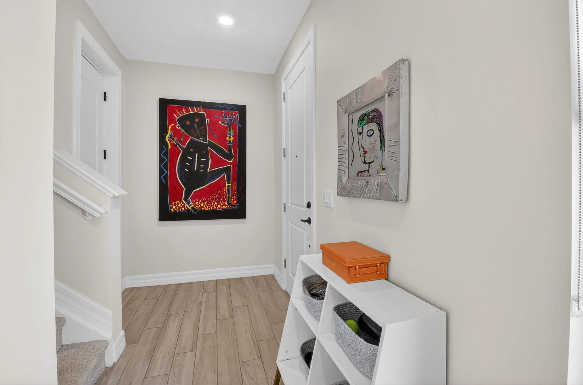 Entry Foyer leading to front door, elevator, and or stairs