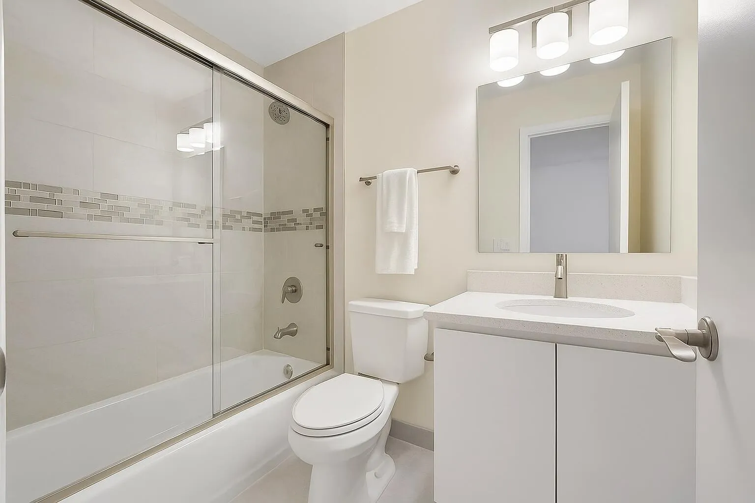 **digitally staged - guest bathroom accessible from hallway!