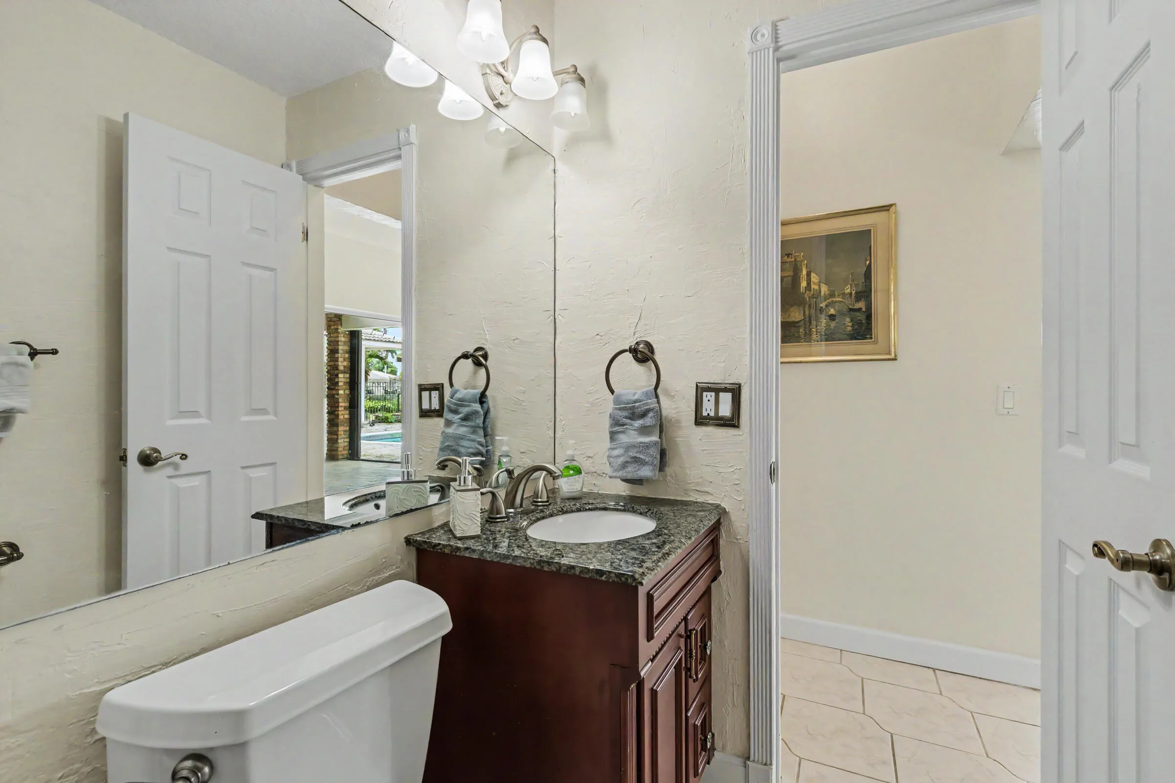 Full Bathroom near open kitchen area