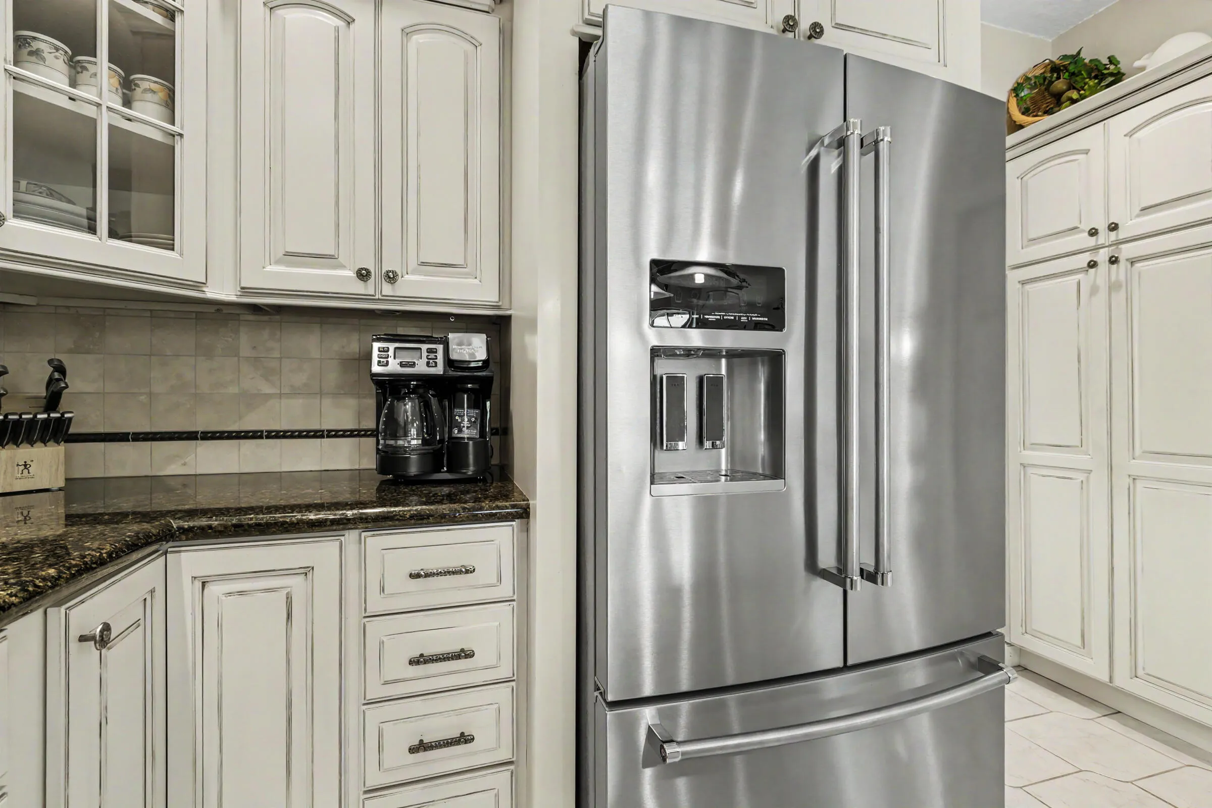 Plenty of storage including built-in pantry in kitchen
