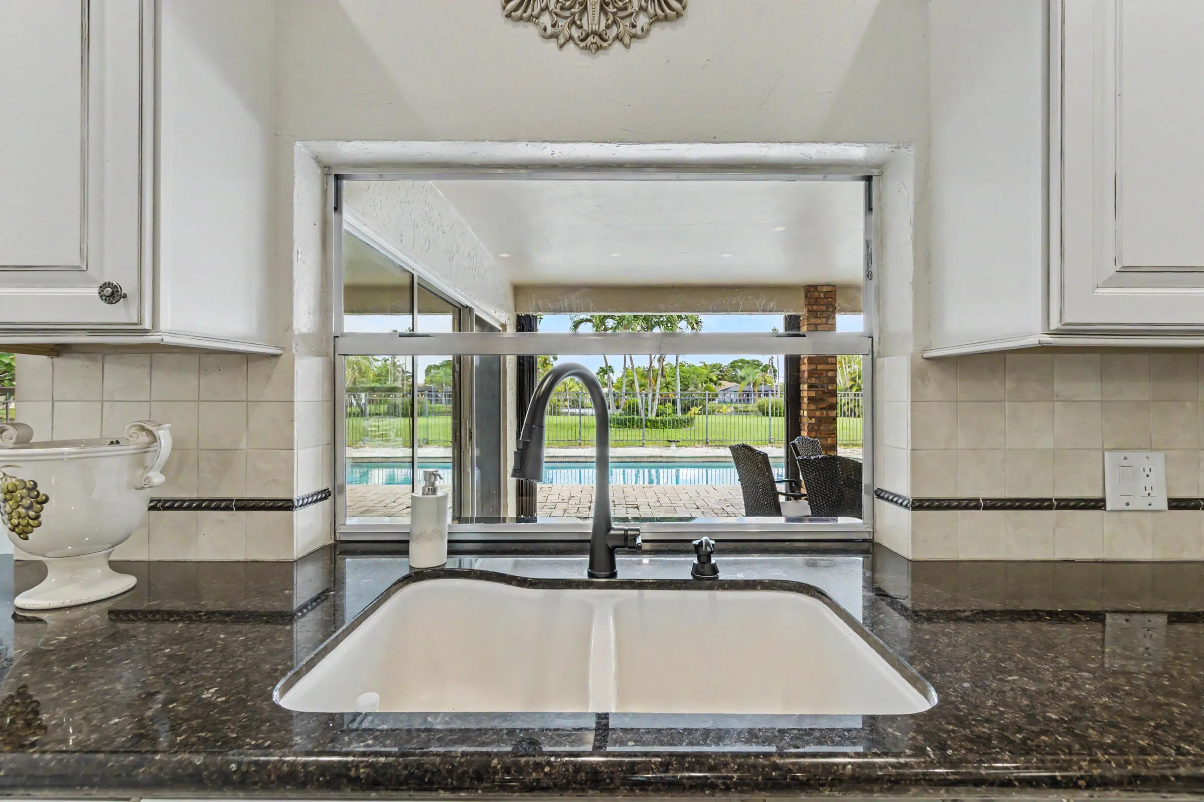 Large pass through window to covered patio