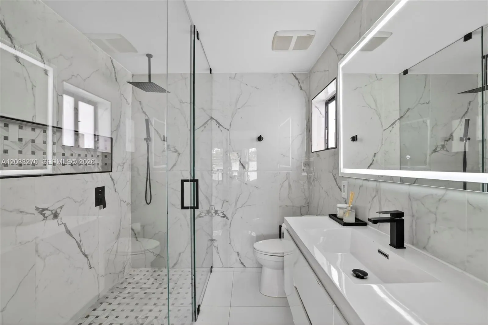 Dual head shower